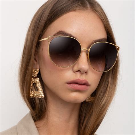 Women's Gold Designer Sunglasses .